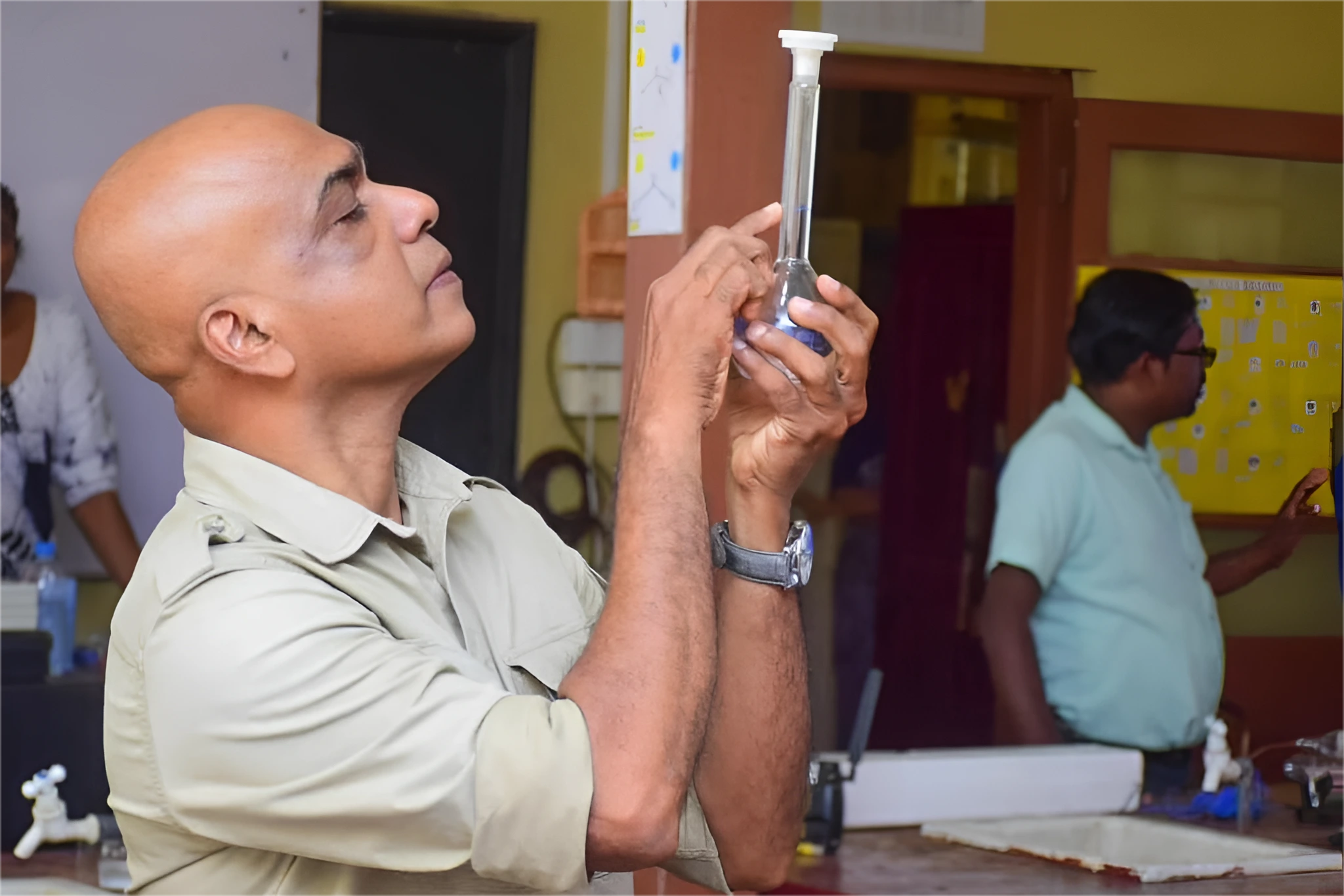 Science laboratory with equipment and students